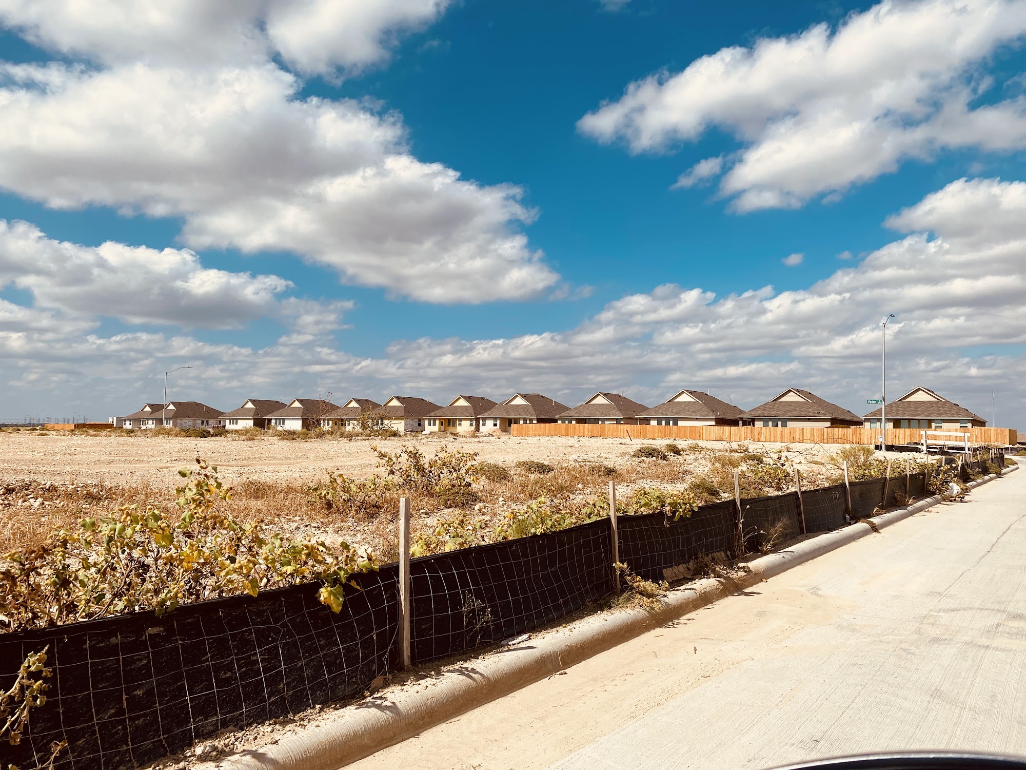 New construction homes on the northern edge of Frisco, photographed from the street